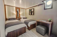 The twin deluxe staterooms are spacious and well-appointed