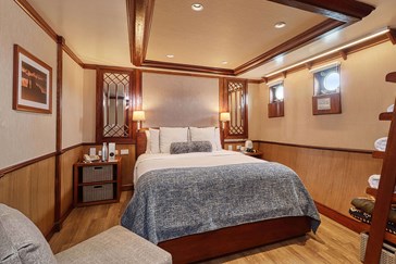A queen premium stateroom on the Carolina deck