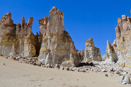 Towering sandstone formations rise from the desert floor in Chile's Atacama highlands. 
