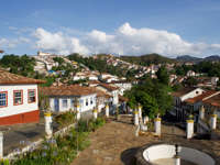 View of the colonial houses and cobbled streets in historic Ouro Preto, Minas Gerais, Brazil. 
