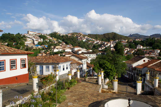 View of the colonial houses and cobbled streets in historic Ouro Preto, Minas Gerais, Brazil. 