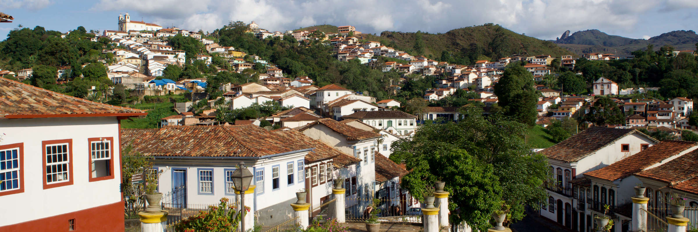 View of the colonial houses and cobbled streets in historic Ouro Preto, Minas Gerais, Brazil. 