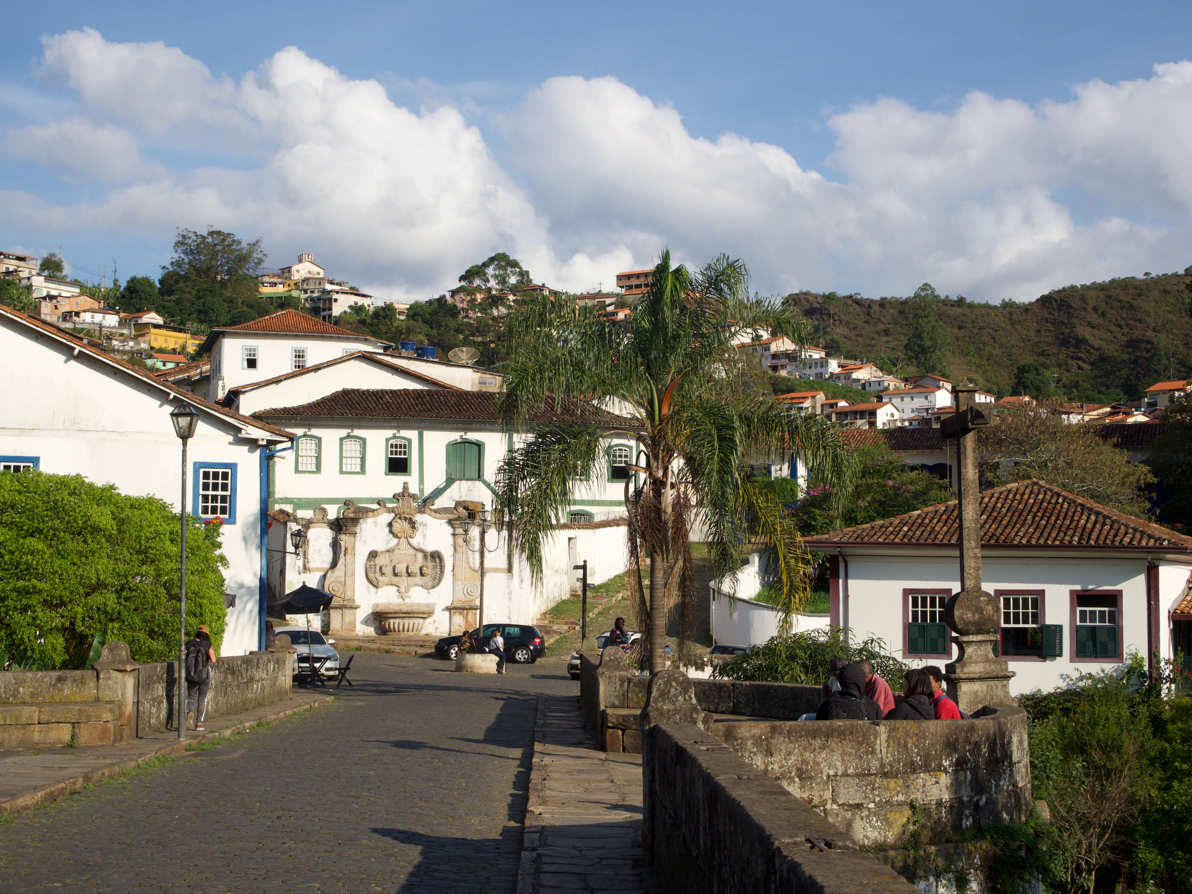Colonial stone bridge leading to the historic gateway of Ouro Preto in Minas Gerais, Brazil. 