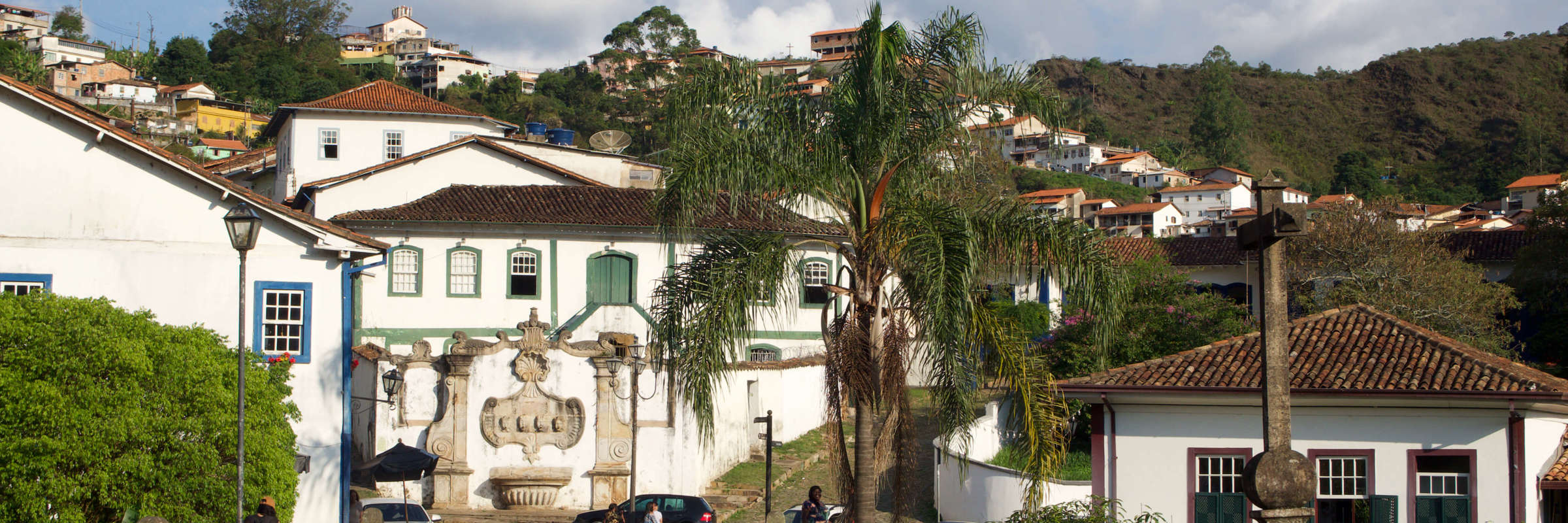Colonial stone bridge leading to the historic gateway of Ouro Preto in Minas Gerais, Brazil. 