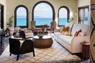 The living room in a one bedroom pool suite 