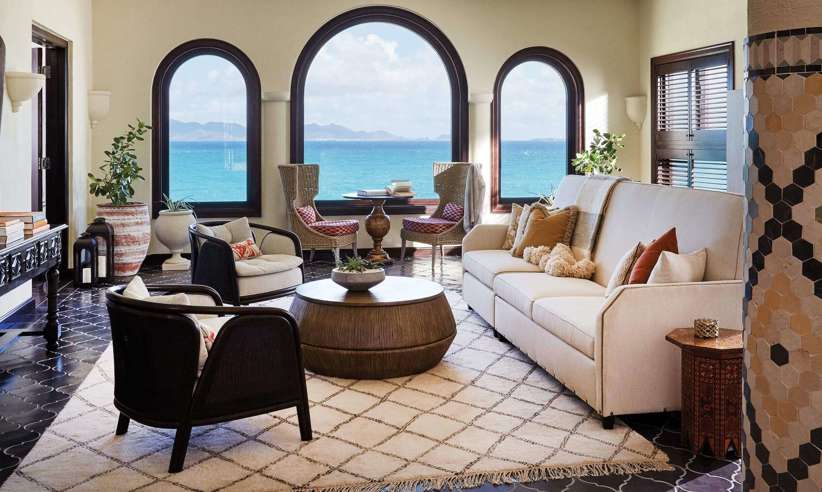 The living room in a one bedroom pool suite 