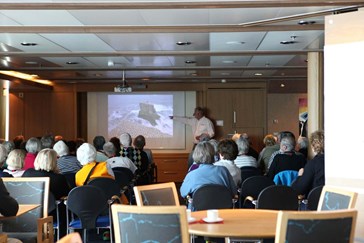 Enjoy lectures from expert speakers throughout your cruise