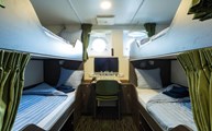 A four bed porthole cabin