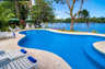 Pool surrounded by tropical forest