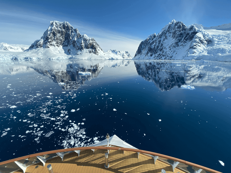 Cruising past icebergs