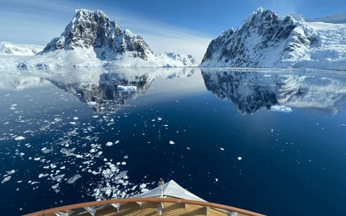 Cruising past icebergs