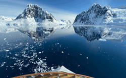 Cruising past icebergs