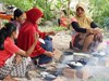 Villagers cooking 
