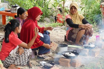 Villagers cooking 
