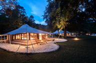 A luxury tent at dusk