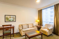 Superior twin room sofa area