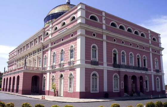 Exterior of the historic pink Teatro Amazonas opera house in Manaus. 