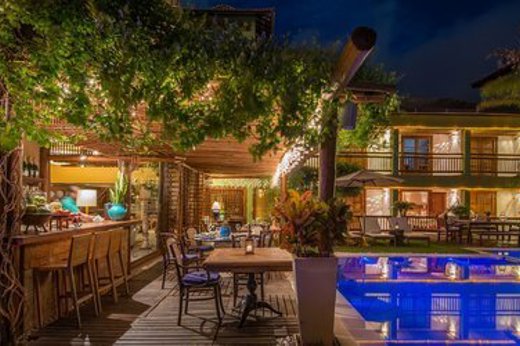 Enjoy a drink at the bar by the pool