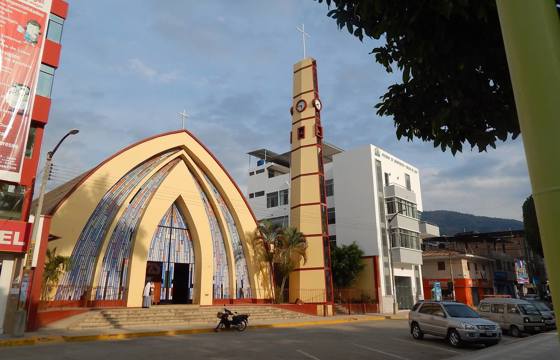 A strikingly modern church rises beside Cajamarca's main plaza under the Andean sky. 