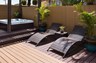 The Jacuzzi and sun loungers 