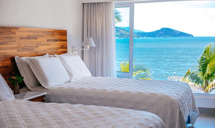 Twin room with a beach view