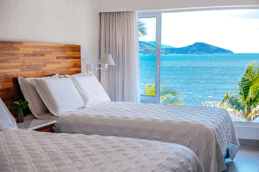 Twin room with a beach view