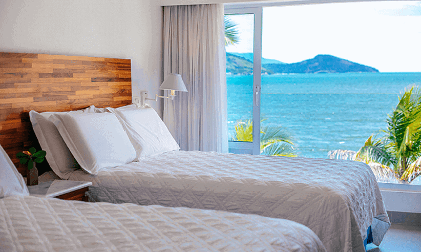 Twin room with a beach view