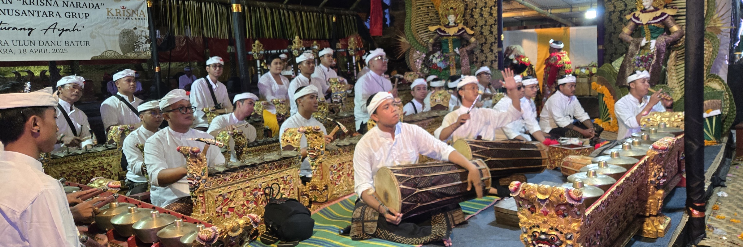 A Balinese gamelan orchestra performs in ceremonial dress during the galungan festival in Bali, Indonesia 