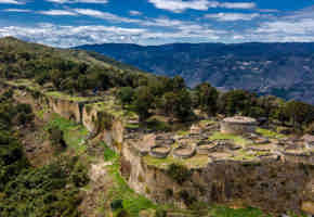 The hilltop stone fortress of Kuelap, built by the Chachapoya people, overlooks the Andean mountains of northern Peru. 