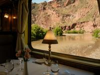 Scenic river and canyon views from the window of a luxury train to Machu Picchu, Peru. 