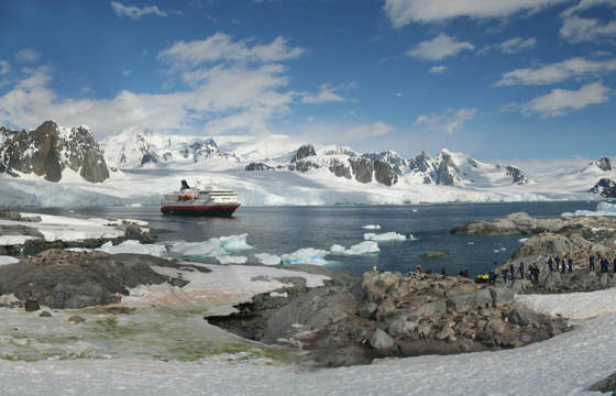 Expedition cruise lands in Antarctica amid glaciers, mountains, and wildlife. 