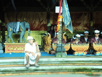 Traditional Balinese musicians perform a gamelan ensemble in ceremonial dress in Bali, Indonesia. 